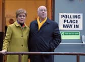 SNP leader Nicola Sturgeon with husband Peter Murrell as they cast their votes in the 2019 General Election at Broomhouse Park Community Hall in Glasgow. Picture: Andrew Milligan/PA Wire