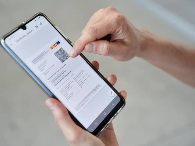 After initial problems because so many wanted one, Scotland's vaccine passport system is now working well, says Angus Robertson (Picture: Pau Barrena/AFP via Getty Images)