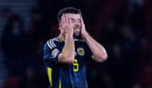 Scotland's Grant Hanley looks dejected at full time after the 3-2 defeat to Poland at Hampden. (Photo by Craig Williamson / SNS Group)
