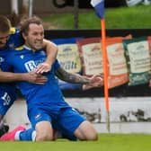 St. Johnstone's Shaun Rooney and Stevie May celebrate going 1-0 up during a Scottish Premiership play-off second leg between St. Johnstone and Inverness Caledonian Thistle at McDiarmid Park.  (Photo by Craig Foy / SNS Group)