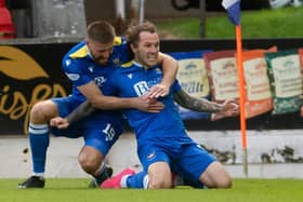 St. Johnstone's Shaun Rooney and Stevie May celebrate going 1-0 up during a Scottish Premiership play-off second leg between St. Johnstone and Inverness Caledonian Thistle at McDiarmid Park.  (Photo by Craig Foy / SNS Group)