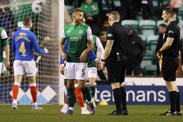 Hibs' Ryan Porteous complains to referee John Beaton. (Photo by Craig Williamson / SNS Group)