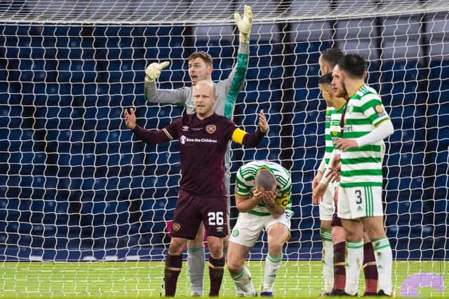 John Beaton stepped in after the pair clashed consistently in Conor Hazard's area at Hearts corners (Photo by Craig Williamson / SNS Group)