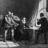Mary Queen of Scots Compelled to Sign her Abdication in the Castle of Lochleven, engraving by T Brown from a picture by Sir William Allen. Image: Hulton Archive/Getty Images