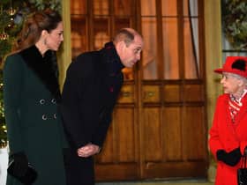 Queen Elizabeth II talks with the Duke and Duchess of Cambridge in the quadrangle at Windsor Castle to meet and thank members of the Salvation Army and local volunteers and key workers from organisations and charities in Berkshire, for the work they are doing to help others during the pandemic and over Christmas (photo: Glyn Kirk/PA Wire).