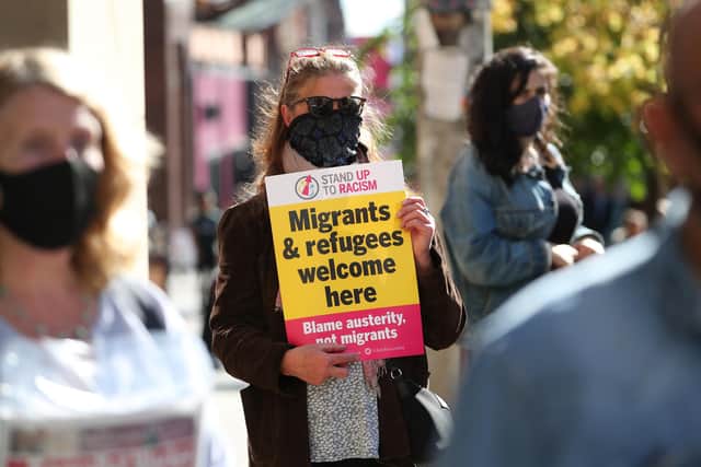 Demonstrators take part in a Refugees Welcome rally in Glasgow.