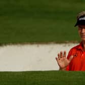 Bernhard Langer reacts after playing a shot from a bunker on the ninth hole during the first round of the Masters at Augusta National. Picture: Patrick Smith/Getty Images