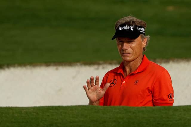 Bernhard Langer reacts after playing a shot from a bunker on the ninth hole during the first round of the Masters at Augusta National. Picture: Patrick Smith/Getty Images