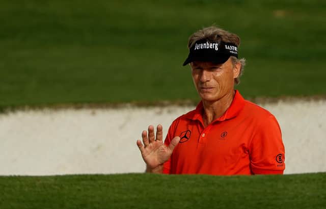 Bernhard Langer reacts after playing a shot from a bunker on the ninth hole during the first round of the Masters at Augusta National. Picture: Patrick Smith/Getty Images