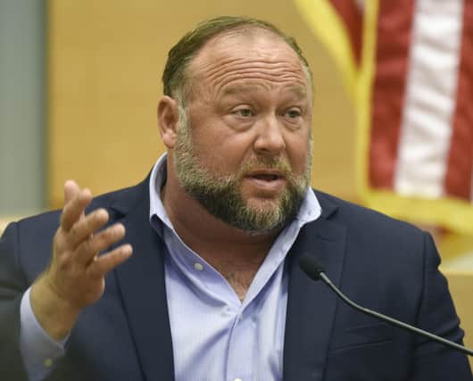 Conspiracy theorist Alex Jones has been ordered to pay $965m (£869m) in damages after falsely claiming the 2012 Sandy Hook school shooting was a hoax.