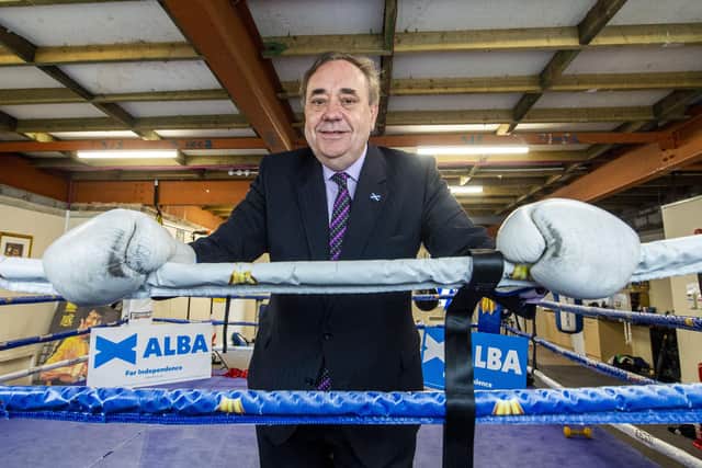 Alba Party leader and former first minister Alex Salmond gets into the ring at candidate Alex Arthur's boxing gym. Picture: Lisa Ferguson