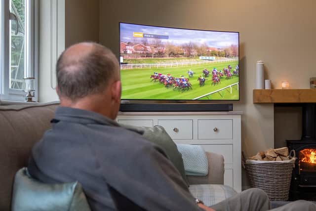 A man watching TV. More than one in ten cases of heart disease could be prevented if people slashed the amount of time they spent in front of the TV, a new study suggests. Picture: Joe Giddens/PA Wire