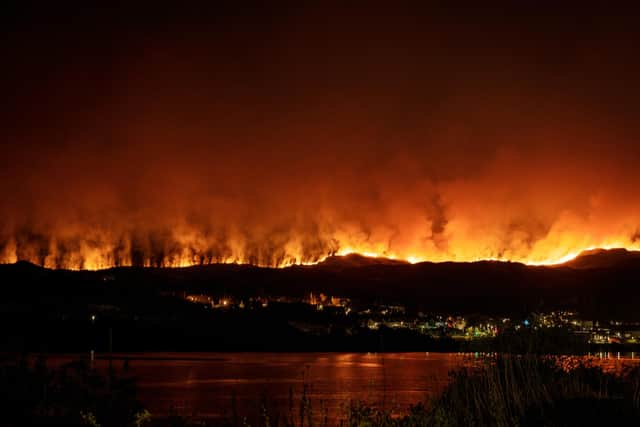 Flames from the massive fire lit up the night sky above Kyle of Lochalsh, creating a dramatic spectacle visible from the Isle of Skye. Picture: Lynne Kennedy