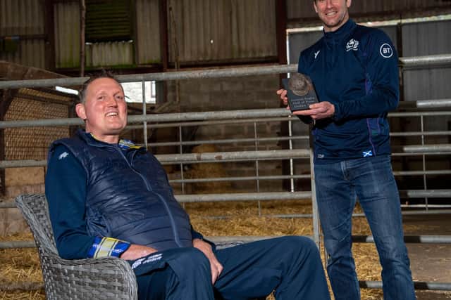 Doddie Weir is presented with a sculpted memento by Chris Paterson to mark his induction into the Scottish Rugby Hall of Fame. Picture: Bill Murray/SNS