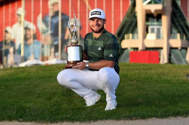 Tyrrell Hatton celebrates his fourth Rolex Series victory after winning the Abu Dhabi HSBC Championship at Abu Dhabi Golf Club in January. Picture: Ross Kinnaird/Getty Images.