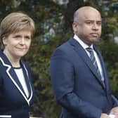 First Minister Nicola Sturgeon with Sanjeev Gupta, the head of the Liberty Group, ahead of a ceremony where Tata Steel handed over the keys of two Lanarkshire steel plants to metals firm Liberty House, at Dalzell steelworks in Scotland.