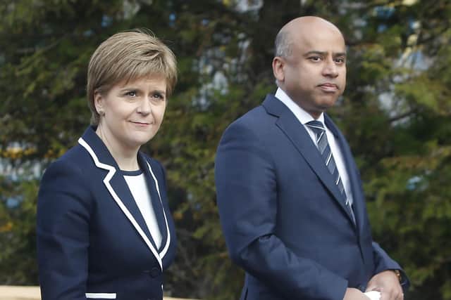 First Minister Nicola Sturgeon with Sanjeev Gupta, the head of the Liberty Group, ahead of a ceremony where Tata Steel handed over the keys of two Lanarkshire steel plants to metals firm Liberty House, at Dalzell steelworks in Scotland.