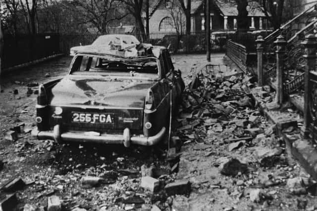 A car damaged by falling debris in Glasgow in January 1968 after a fierce storm swept in, killing 20.  (Photo by Keystone/Getty Images)