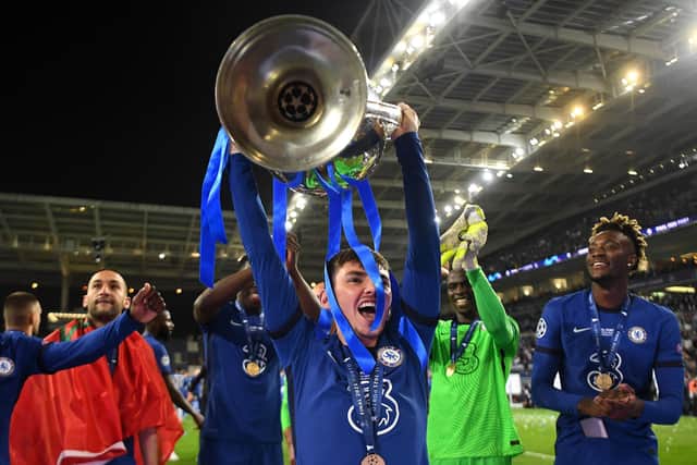 Billy Gilmour of Chelsea celebrates with the Champions League Trophy following their team's victory during the UEFA Champions League Final between Manchester City and Chelsea FC at Estadio do Dragao on May 29, 2021 in Porto, Portugal. (Photo by David Ramos/Getty Images)