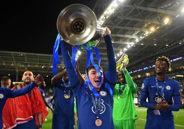 Billy Gilmour of Chelsea celebrates with the Champions League Trophy following their team's victory during the UEFA Champions League Final between Manchester City and Chelsea FC at Estadio do Dragao on May 29, 2021 in Porto, Portugal. (Photo by David Ramos/Getty Images)