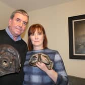 Keith and Dianne Corner with the helmet and goggles they believe belonged to Sgt Clelland from Dysart.