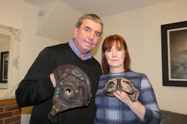 Keith and Dianne Corner with the helmet and goggles they believe belonged to Sgt Clelland from Dysart.