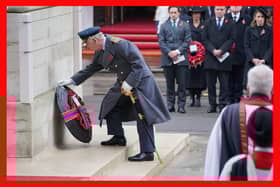 King Charles III lays a wreath during the Remembrance Sunday service at the Cenotaph, in Whitehall, London. PIC:  Jonathan Brady/PA Wire