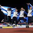 Bronze medalists Zoey Clark, Beth Dobbin, Jill Cherry and Nicole Yeargin celebrate following the medal ceremony for the Women's 4 x 400m Relay Final at the Birmingham Commonwealth Games. (Photo by Tom Dulat/Getty Images)
