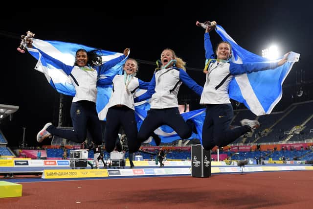 Bronze medalists Zoey Clark, Beth Dobbin, Jill Cherry and Nicole Yeargin celebrate following the medal ceremony for the Women's 4 x 400m Relay Final at the Birmingham Commonwealth Games. (Photo by Tom Dulat/Getty Images)