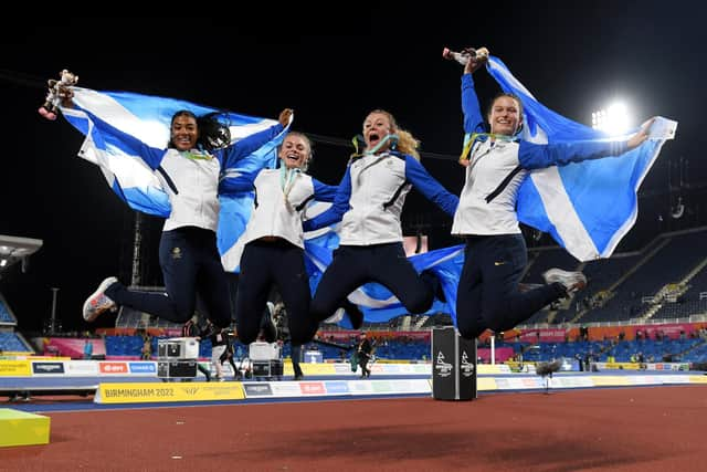 Bronze medalists Zoey Clark, Beth Dobbin, Jill Cherry and Nicole Yeargin celebrate following the medal ceremony for the Women's 4 x 400m Relay Final at the Birmingham Commonwealth Games. (Photo by Tom Dulat/Getty Images)