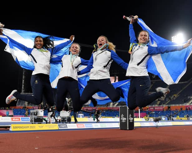 Bronze medalists Zoey Clark, Beth Dobbin, Jill Cherry and Nicole Yeargin celebrate following the medal ceremony for the Women's 4 x 400m Relay Final at the Birmingham Commonwealth Games. (Photo by Tom Dulat/Getty Images)