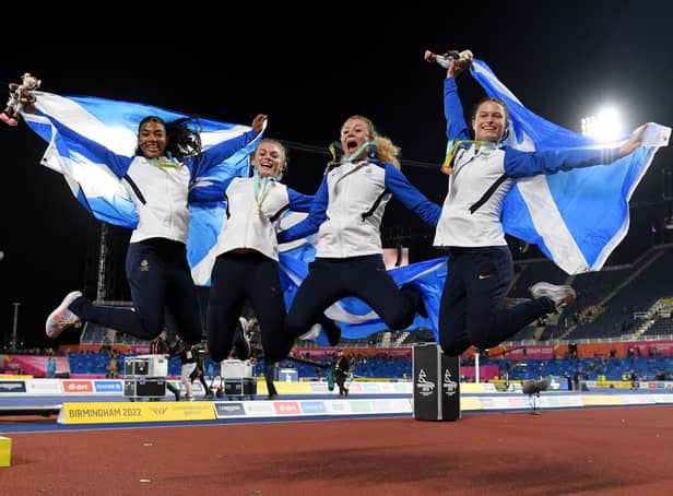 Bronze medalists Zoey Clark, Beth Dobbin, Jill Cherry and Nicole Yeargin celebrate following the medal ceremony for the Women's 4 x 400m Relay Final at the Birmingham Commonwealth Games. (Photo by Tom Dulat/Getty Images)