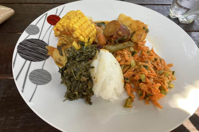 Lebo's Soweto Bicycle Tours exploration of Soweto, ends with a taste of homebrewed beer and meat and vegetable stew, cooked outside and served with the ubiquitous South African pap, a porridge made from maize meal, in the garden opposite Lebo's Backpackers hostel. Pic: J Christie