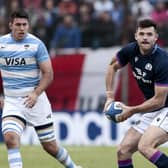 Scotland's Blair Kinghorn tries to spark an attack during the first Test against Argentina.  (Photo by Pablo Gasparini/AFP via Getty Images)