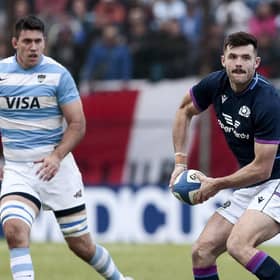 Scotland's Blair Kinghorn tries to spark an attack during the first Test against Argentina.  (Photo by Pablo Gasparini/AFP via Getty Images)