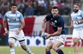 Scotland's Blair Kinghorn tries to spark an attack during the first Test against Argentina.  (Photo by Pablo Gasparini/AFP via Getty Images)