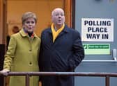 Former SNP leader Nicola Sturgeon with husband Peter Murrell as they cast their votes in the 2019 General Election at Broomhouse Park Community Hall in Glasgow. Picture: Andrew Milligan/PA Wire
