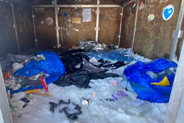 Mountain rescuers are unable to use the summit shelter on Ben Nevis after climbers left behind tents, clothing and rubbish - as well as human waste. PIC: Lochaber MRT.