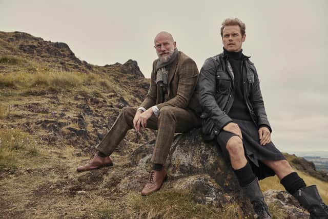 Sam Heughan and Graham McTavish take a breather on their tour of the Highlands.