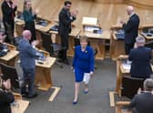 Outgoing First Minister Nicola Sturgeon leaves the main chamber after her last First Minster's Questions (FMQs) in the main chamber of the Scottish Parliament in Edinburgh.