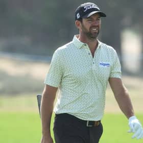 Scott Jamieson walks up the 18th hole on day one of the Ras al Khaimah Championship presented by Phoenix Capital at Al Hamra Golf Club. Picture: Andrew Redington/Getty Images.