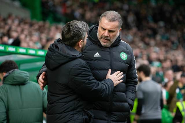 Johnson and Celtic manager Ange Postecoglou during a recent match at Celtic Park.