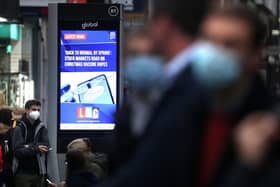 A digital advertising board in Glasgow displaying a news article about the possibility of a vaccine being found. Picture: Andrew Milligan/PA Wire