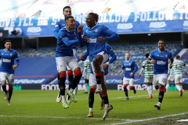 Rangers captain James Tavernier celebrates with Joe Aribo after the only goal of the 1-0 win against Celtic at Ibrox on January 2. (Photo by Ian MacNicol/Getty Images)