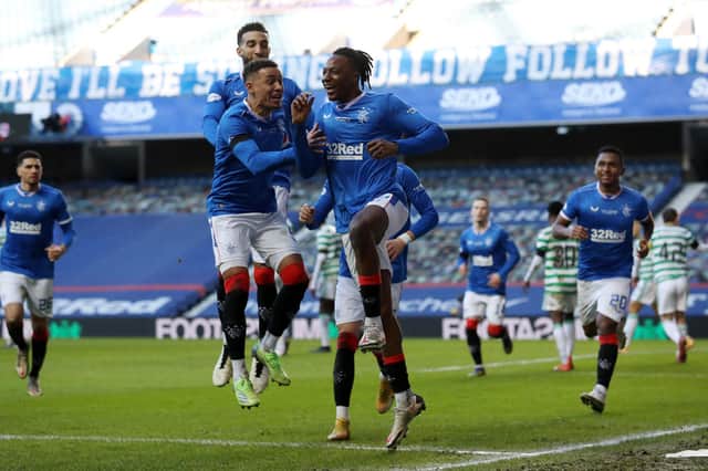 Rangers captain James Tavernier celebrates with Joe Aribo after the only goal of the 1-0 win against Celtic at Ibrox on January 2. (Photo by Ian MacNicol/Getty Images)