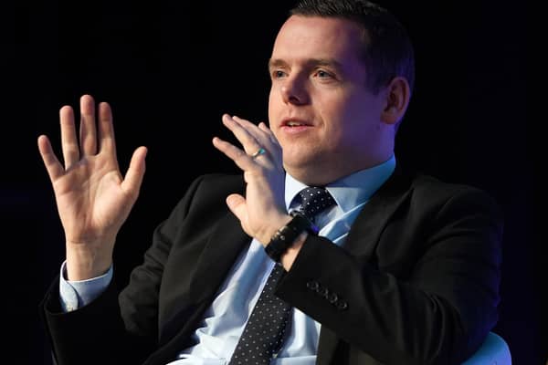 Douglas Ross speaking on stage on the second day of the Scottish Conservative party conference at the Scottish Event Campus (SEC) in Glasgow.