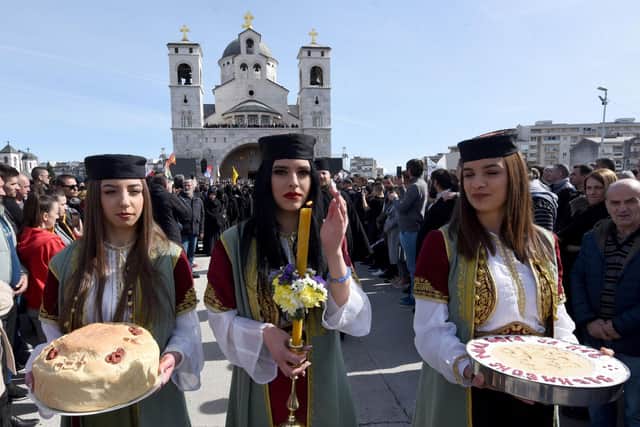 Thousands of followers of the Serbian Orthodox Church in Montenegro gather for a mass prayer and protest march against a new law in the capital Podgorica in February last year (Picture: Savo Prelevic/AFP via Getty Images)