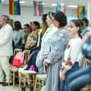 The decision to house Ukrainian refugees, seen observing a minute's silence for Ukrainian troops, on the MS Victoria cruise ship explains one reason why migrants don't move to Scotland – a lack of housing (Picture: Peter Summers/Getty Images)