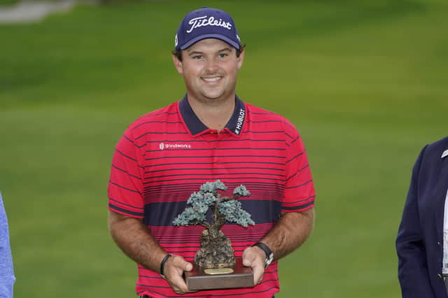 Patrick Reed with the trophy after winning the Farmers Insurance Open at Torrey Pines. Picture: Gregory Bull/AP