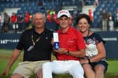 Sam Locke, flanked by his parents, shows off the Silver Medal after finishing as leading amateur in 2018 Open at Carnoustie. Picture: Andy Buchanan/AFP via Getty Images.